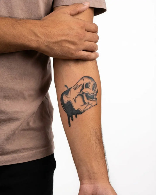INKON Forbidden Fruit Skull semi-permanent tattoo applied on a man – 3 x 4 in (7x10cm) design, realistic ink look, lasts 10 days