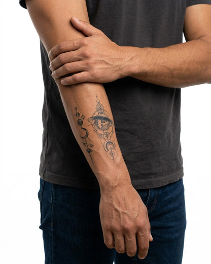 INKON Cosmic Globe & Planets semi-permanent tattoo applied on a man – 3 x 4 in (6x11cm) design, realistic ink look, lasts 10 days