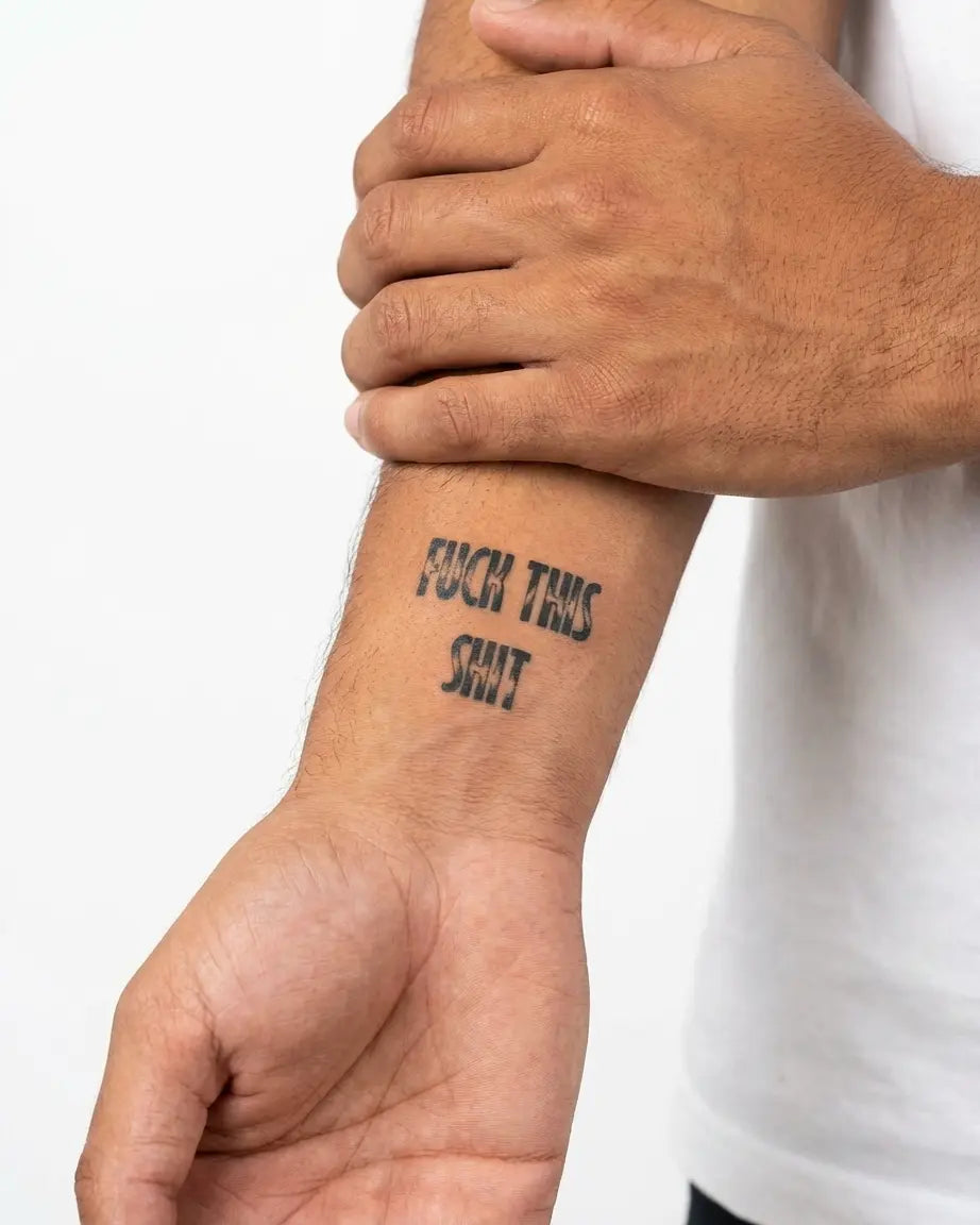 INKON Distressed Expletive Quote semi-permanent tattoo applied on a man – 2 x 2 in (5x5cm) design, realistic ink look, lasts 10 days
