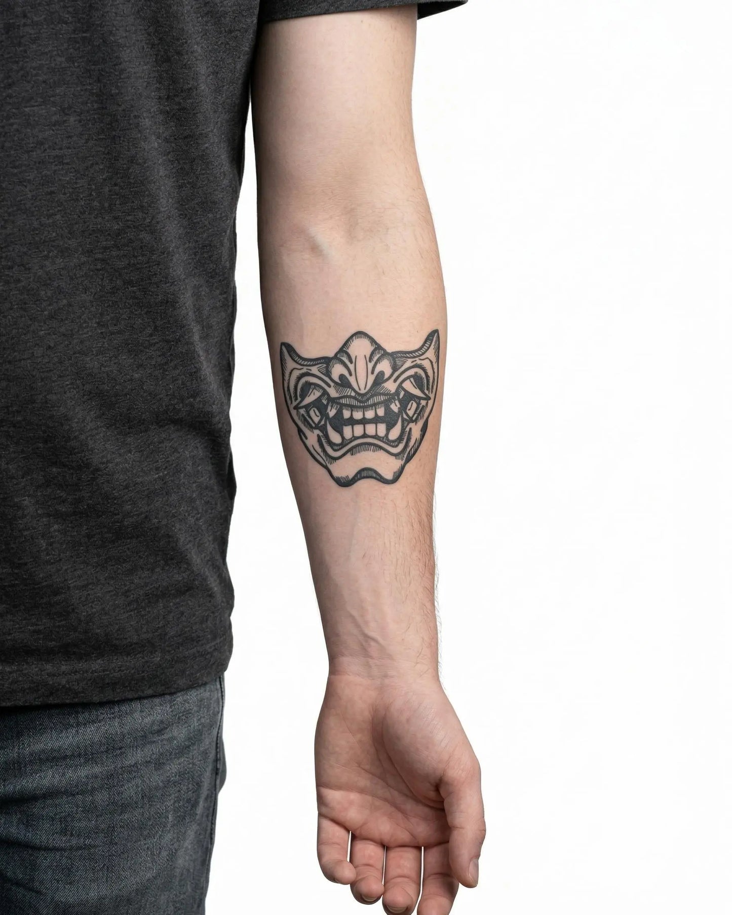 INKON Oni Mask semi-permanent tattoo applied on a man – 4 x 4 in (9x9cm) design, realistic ink look, lasts 10 days