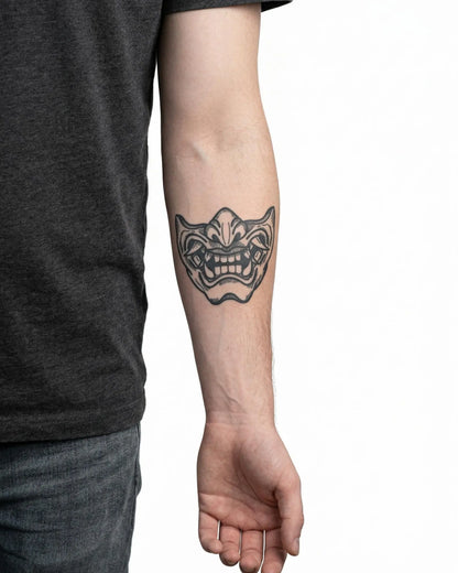 INKON Oni Mask semi-permanent tattoo applied on a man – 4 x 4 in (9x9cm) design, realistic ink look, lasts 10 days