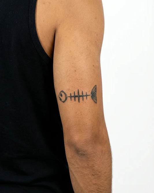 INKON Minimalist Fish Skeleton semi-permanent tattoo applied on a man – 3 x 4 in (6x11cm) design, realistic ink look, lasts 10 days