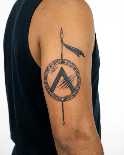 INKON Spartan Shield & Spear semi-permanent tattoo applied on a man – 4 x 7 in (10x17cm) design, realistic ink look, lasts 10 days