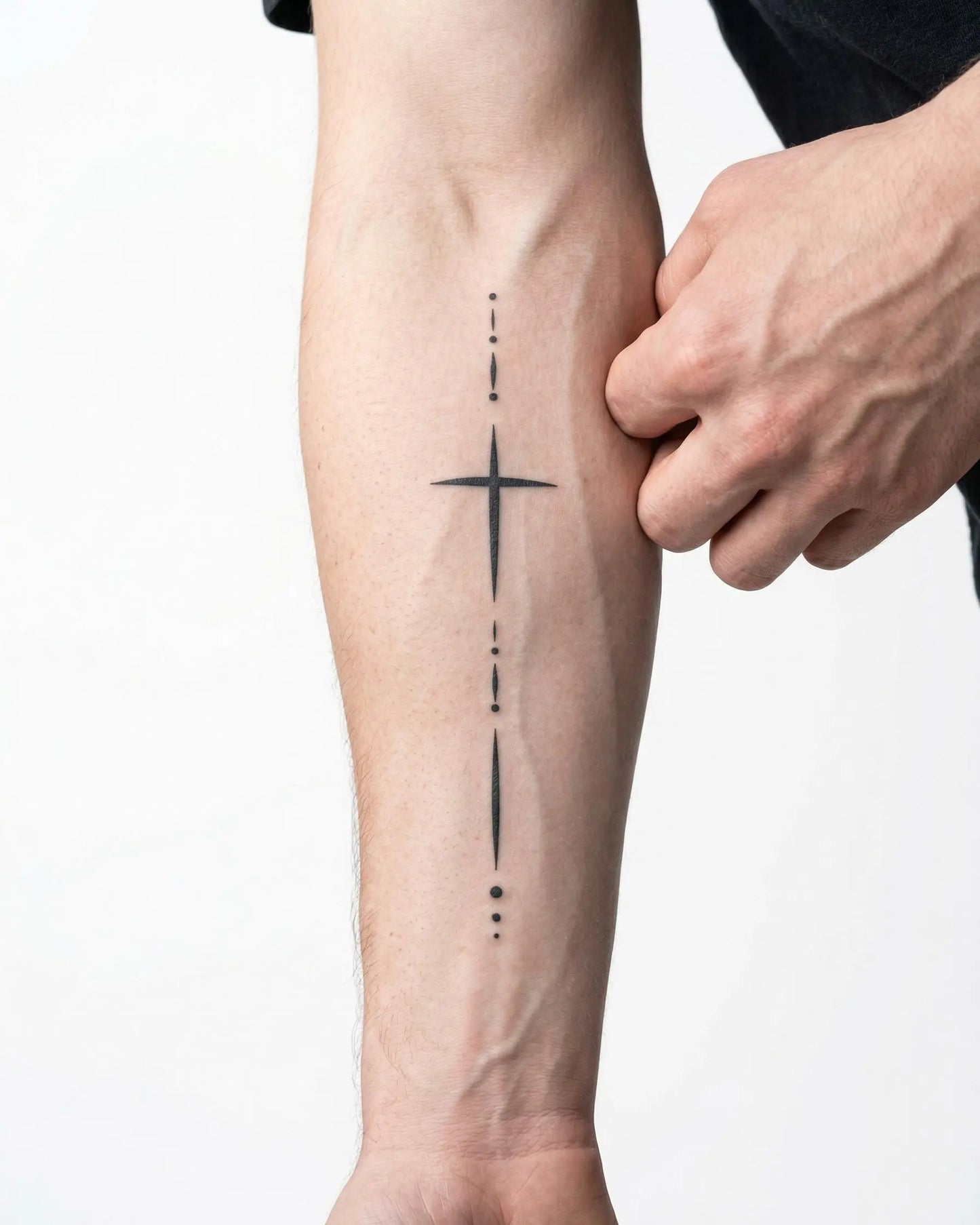 INKON Minimalist Cross & Dots semi-permanent tattoo applied on a man – 4 x 7 in (10x17cm) design, realistic ink look, lasts 10 days