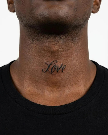 INKON Love Script semi-permanent tattoo applied on a man – 2 x 2 in (5x5cm) design, realistic ink look, lasts 10 days
