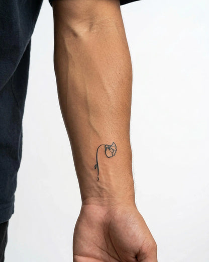 INKON Semicolon Flower semi-permanent tattoo applied on a man – 2 x 2 in (5x5cm) design, realistic ink look, lasts 10 days