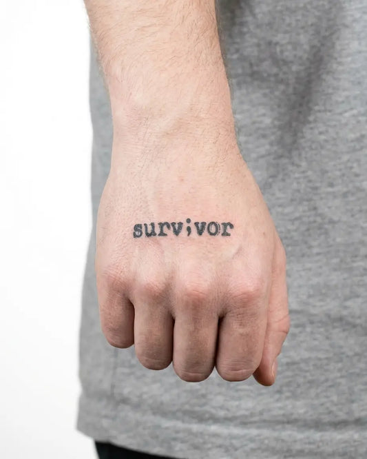 INKON Semicolon Survivor semi-permanent tattoo applied on a man – 2 x 2 in (5x5cm) design, realistic ink look, lasts 10 days