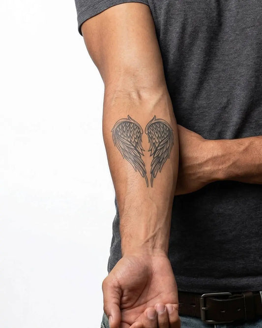 INKON Angel Wings semi-permanent tattoo applied on a man – 3 x 4 in (7x10cm) design, realistic ink look, lasts 10 days