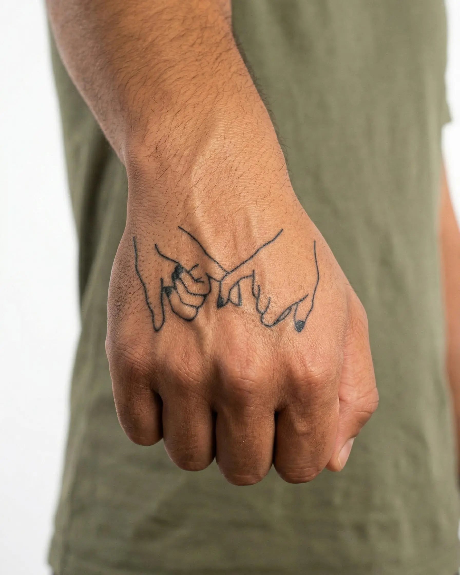 INKON Pinky Promise semi-permanent tattoo applied on a man – 2 x 2 in (5x5cm) design, realistic ink look, lasts 10 days