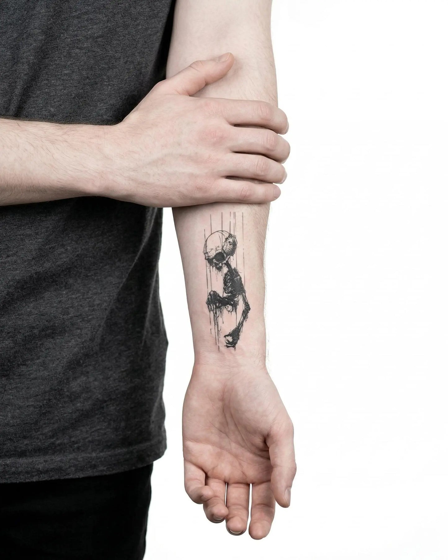 INKON Fallen Skeleton semi-permanent tattoo applied on a man – 3 x 4 in (6x11cm) design, realistic ink look, lasts 10 days
