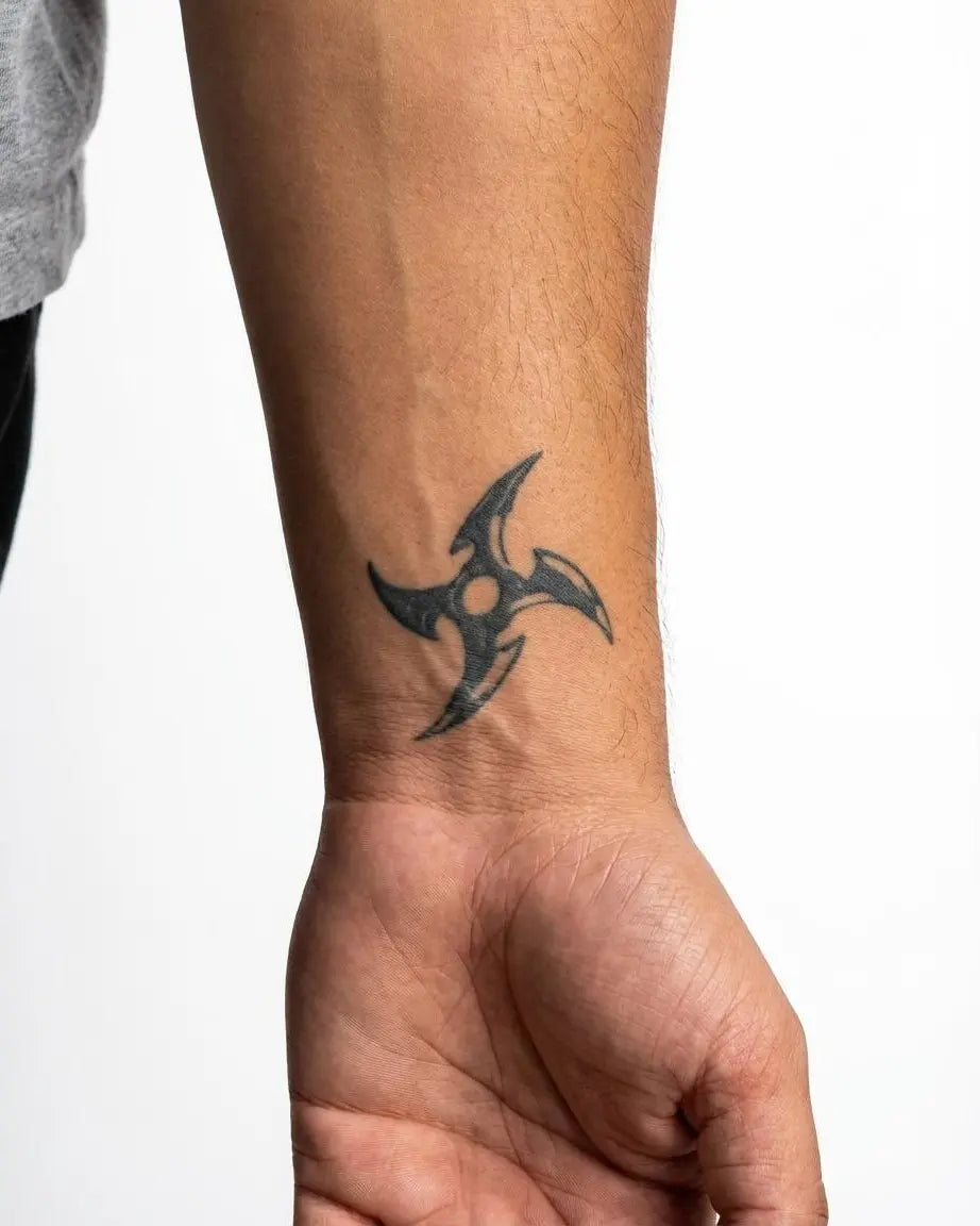 INKON Ninja Star semi-permanent tattoo applied on a man – 2 x 2 in (5x5cm) design, realistic ink look, lasts 10 days