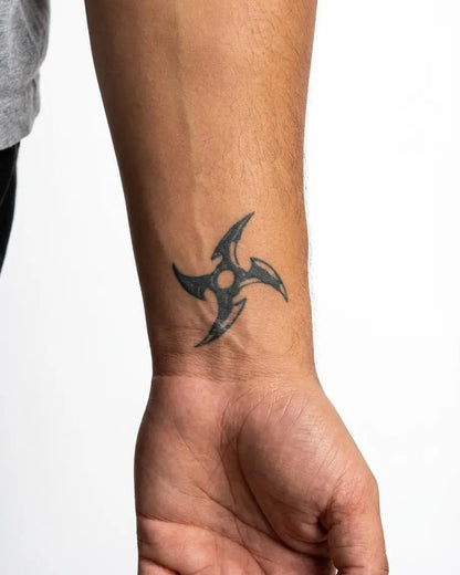 INKON Ninja Star semi-permanent tattoo applied on a man – 2 x 2 in (5x5cm) design, realistic ink look, lasts 10 days