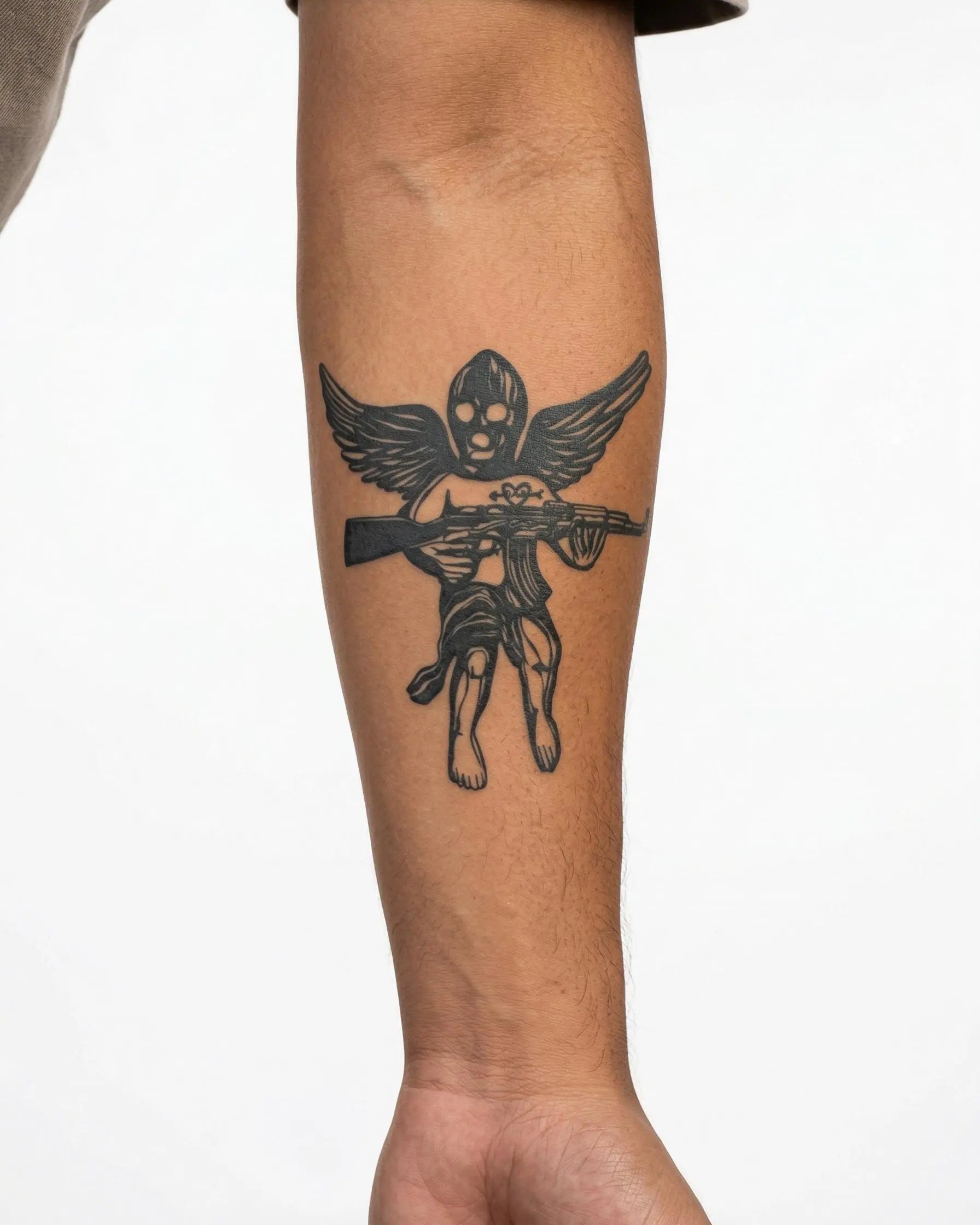 INKON Masked Cherub semi-permanent tattoo applied on a man – 3 x 4 in (7x10cm) design, realistic ink look, lasts 10 days
